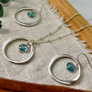 Sterling Silver Circle with Blue Topaz Drop Earrings